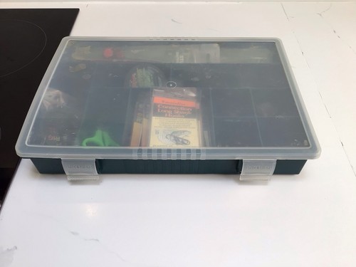 Tackle box with mixed - tackle, terminal